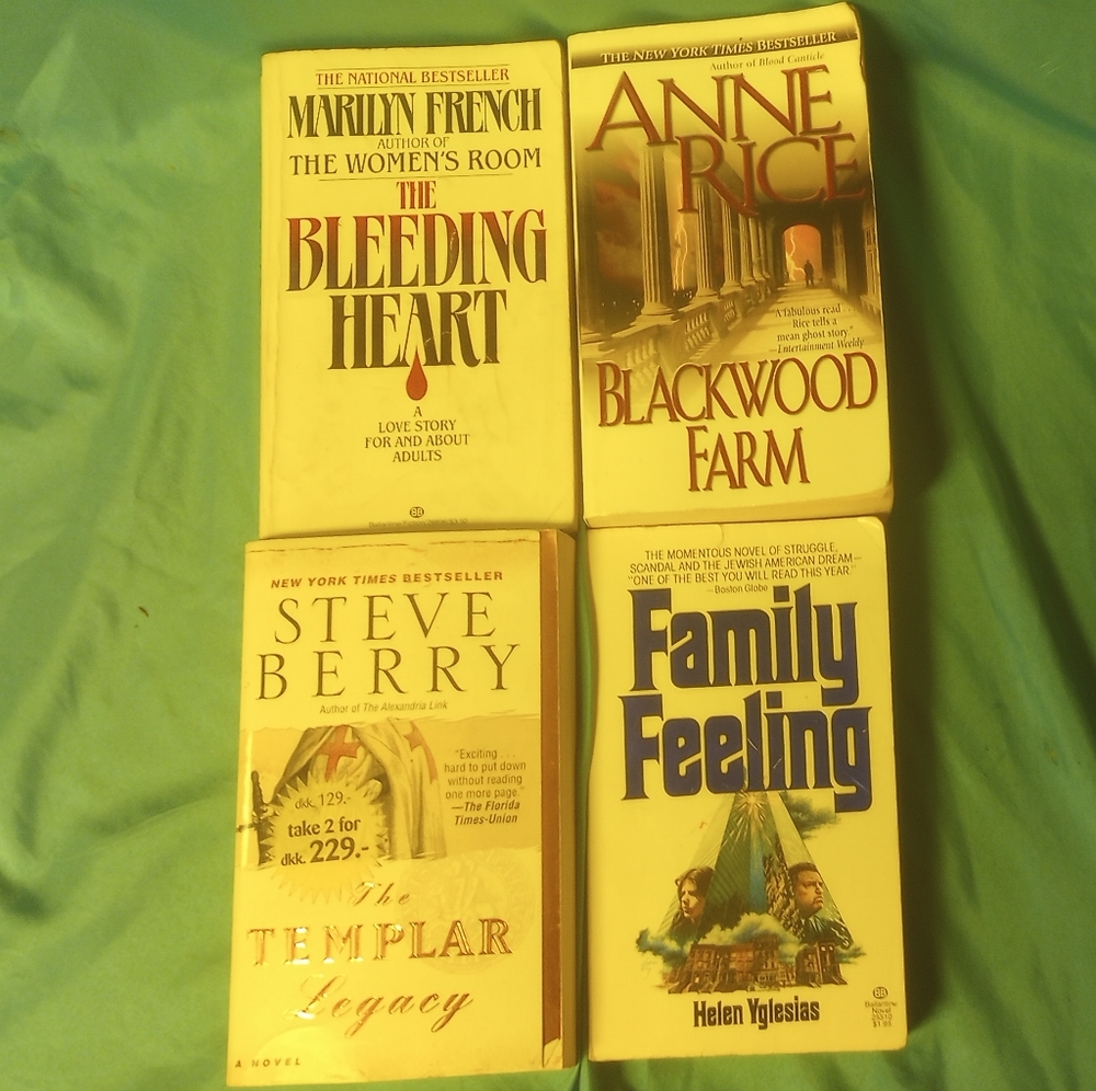 Four paperback novels New York best sellers